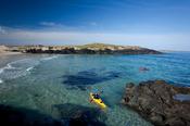 Sea kayaking in False Bay, Mannin, Connemara, Co Galway, Ireland.