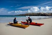 Sea kayakers resting in False Bay, Mannin, Connemara, Co Galway, Ireland.