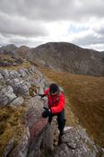 Scrambling on Benbaun, Twelve Bens Mountains, Connemara, Co Galway Ireland.