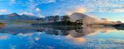 Misty morning reflection of the Twelve Bens in Derryclare Lough, Connemara, Co Galway, Ireland.