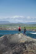 Walkers looking over Coulagh Bay, Beara Way, Co Cork, Ireland.