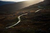 Twisty road climbing to the Healy Pass, Beara Peninsula, County Cork, Ireland.