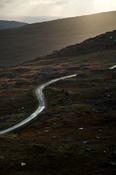 Twisty road climbing to the Healy Pass, Beara Peninsula, County Cork, Ireland.