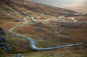 Twisty road climbing to the Healy Pass, Beara Peninsula, County Cork, Ireland.
