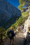 Hikers descending into the Samaria Gorge, Samaria National Park, Crete, Greece.