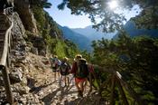 Hikers descending into the Samaria Gorge, Samaria National Park, Crete, Greece.