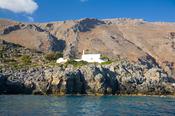 Traditional church beneath the White Mountains, Loutro, Crete, Greece. image