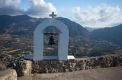 Bell of the mountain-top Timios Stavros Church, near Plakias, Crete, Greece.