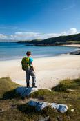 Walker above Clonmass Bay, Ards Forest Park, County Donegal, Ireland.