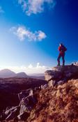 Walker looking towards Errigal from Dooish, Derryveagh Mountains, Co Donegal, Ireland.