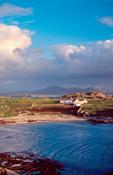 Coastal cottage, Ineuran Bay, Inishowen Peninsula, Co Donegal, Ireland.