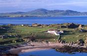 Coastal cottage, Ineuran Bay, Inishowen Peninsula, Co Donegal, Ireland.