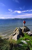 Walker on Buncrana coastal path, Inishowen, Co Donegal, Ireland.