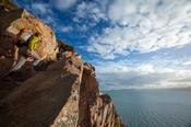 Walker at Red Rock, Howth Coatal Path, County Dublin, Ireland.