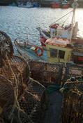 Fishing boats and lobster pots in Howth harbour, County Dublin, Ireland. image