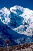Walkers on the Balcon Sud beneath Mt Blanc, Chamonix Valley, French Alps, France.
