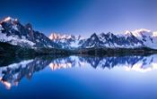 The Mont Blanc massif reflected in Lac des Cheserys, French Alps, France. image
