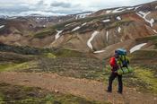 Hiker on the Laugavegur trail near Landmannalaugar. Central Highlands, Sudhurland, Iceland.