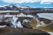 Hikers on the Laugavegur trail  near Storihver hot springs, Hrafntinnusker. Central Highlands, Sudhurland, Iceland.