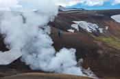 Hikers on the Laugavegur trail  near Storihver hot springs, Hrafntinnusker. Central Highlands, Sudhurland, Iceland.