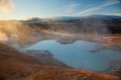 Dawn over a volcanic mineral pool at Leirhnjukur, Krafla volcano, Myvatn, Nordhurland Eystra, Iceland.
