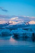 Dawn light over Vatnajokull ice cap and Jokulsarlon glacial lagoon, Sudhurland, Iceland.