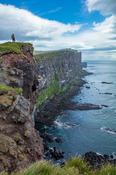 Person on top of the Latrabjarg bird cliffs. Latrabjarg Peninsula, Westfjords, Iceland. image