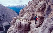 Climber on the via ferrata Sentiero SOSAT, Brenta Dolomites, Italian Alps, Italy.
