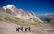 Trekkers on the Tour of Mont Blanc, Val Veni, Italian Alps, Italy.
