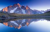 Dawn reflection of Mont Blanc, Val Veni, Tour of Mont Blanc, Italian Alps, Italy.