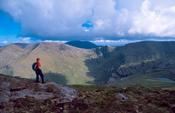 Walker looking to Eskatarriff from Tooth Mountain, Beara Peninsula, Co Kerry, Ireland.