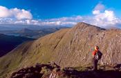 Walker looking to Lackabane from Eskatarriff, Beara Peninsula, Co Kerry, Ireland.