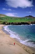Person walking on Clogher Beach, Dingle Peninsula, Co Kerry, Ireland. image