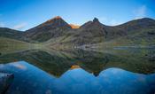 Carrauntoohil and Beenkeragh reflected in Lough Gouragh, Hag's Glen, MacGillycuddy's Reeks, County Kerry, Ireland.