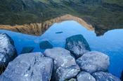 Carrauntoohil and Beenkeragh reflected in Lough Gouragh, Hag's Glen, MacGillycuddy's Reeks, County Kerry, Ireland.