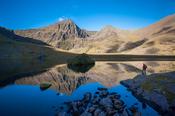 Carrauntoohil and Beenkeragh reflected in Lough Callee, Hag's Glen, MacGillycuddy's Reeks, County Kerry, Ireland.