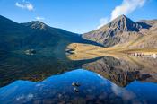 Carrauntoohil reflected in Lough Callee, Hag's Glen, MacGillycuddy's Reeks, County Kerry, Ireland.