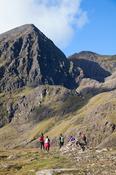 Walkers in Hag's Glen beneath Carrauntoohil, MacGillycuddy's Reeks, County Kerry, Ireland.