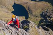 Rock climber on Howling Ridge, Carrauntoohil, MacGillycuddy's Reeks, County Kerry, Ireland.