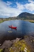 Canoeing on The Long Range, Killarney Lakes, Killarney National Park, County Kerry, Ireland.
