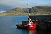 Fishing boat at Carrowteige pier, Broadhaven Bay, Co Mayo, Ireland. image