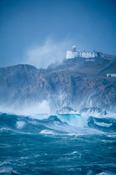 Storm waves crash 75m high above Eagle Island Lighthouse, Belmullet, County Mayo, Ireland. image
