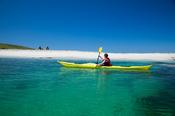 Sea kayaking beside Inishkea South Island, County Mayo, Ireland.