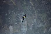 Kitesurfer Francois Colussi launching an aerial beneath Minaun Cliffs, Achill Island, County Mayo, Ireland.