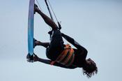 Kitesurfer Francois Colussi launching an aerial, Achill Island, County Mayo, Ireland.