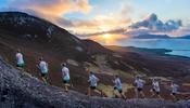 Triathlete Con Doherty racing the sunset on Croagh Patrick, County Mayo, Ireland.