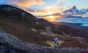 Triathlete Con Doherty racing the sunset on Croagh Patrick, County Mayo, Ireland.