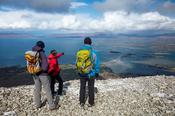 Hikers at the summit of Croagh Patrick, County Mayo, Ireland.
