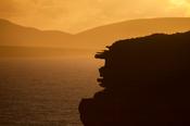 Downpatrick Head silhouetted at sunset, County Mayo, Ireland. image