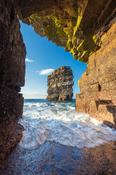 Dun Briste sea stack from a cave beneath Downpatrick Head. County Mayo, Ireland. image